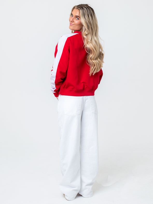 University of Nebraska - Women's Cropped V-Neck Windbreaker  - Red