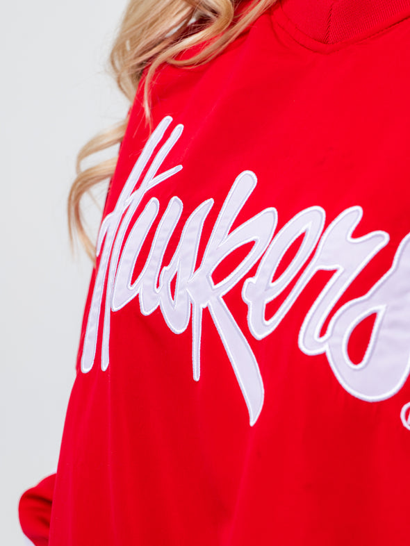 University of Nebraska - Women's Cropped V-Neck Windbreaker  - Red